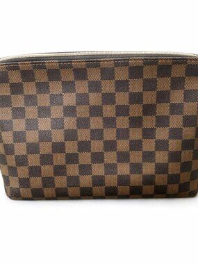 brown checkered toiletry bag